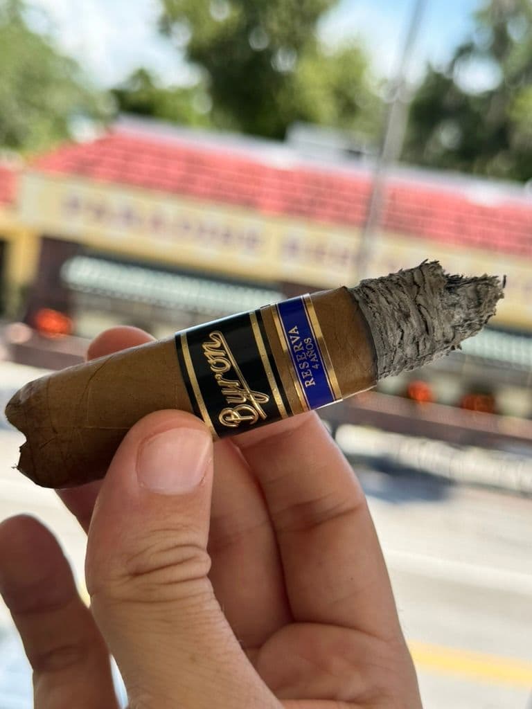 Close-up of Byron Reserva bands with flaky mid-smoke ash