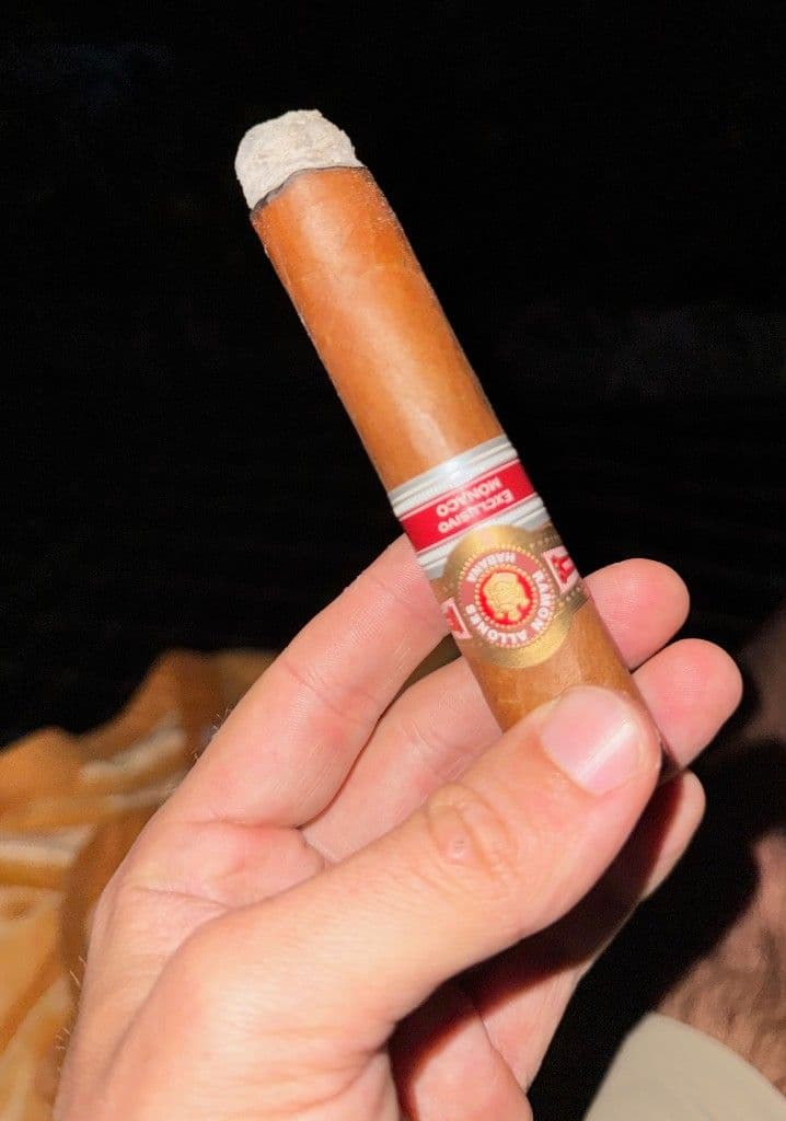 Lit Ramon Allones Casino Monaco cigar showing the Exclusivo Monaco band